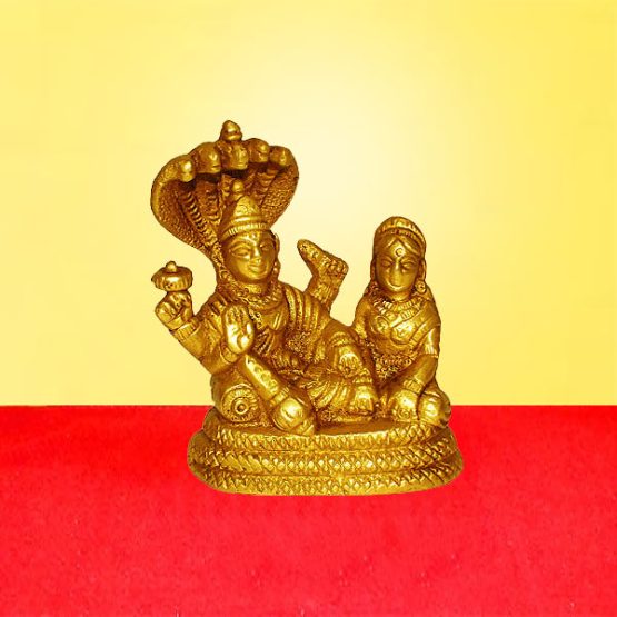 Brass sculpture of Narayan the supreme being with his consort